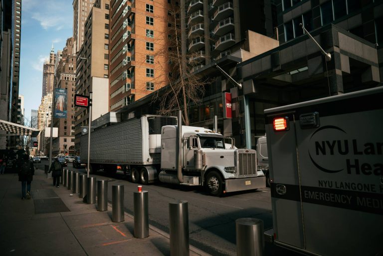Dry van semi trucks at a freight terminal — reliable capacity for supply chain operations